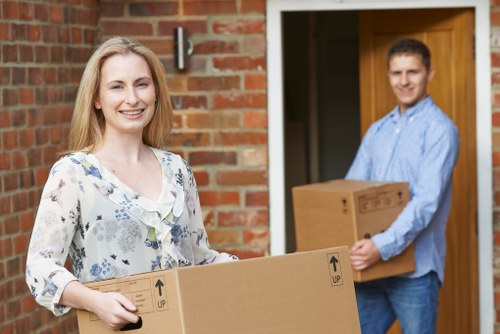 Family using mobile self storage during a house move in Redbridge