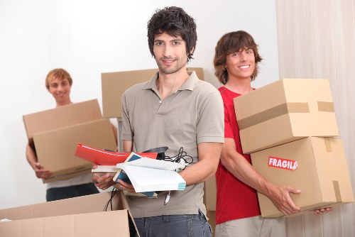Professional movers handling a compact relocation in Redbridge
