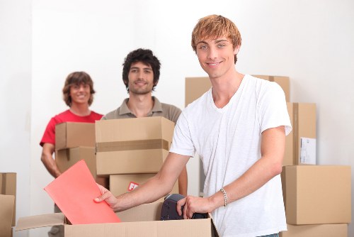 Careful packing for a home move in Redbridge with labelled boxes